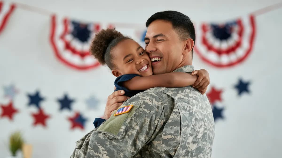 Smiling soldier hugging a happy child with American flag decorations