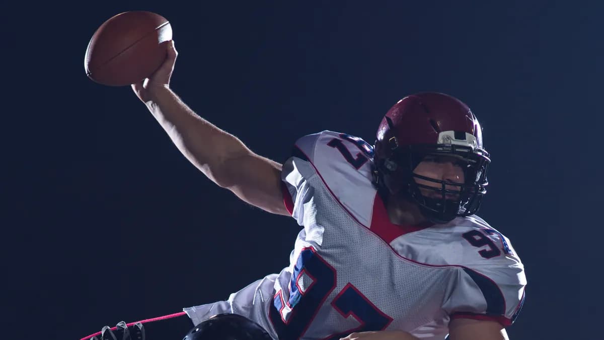American football players in action during a game